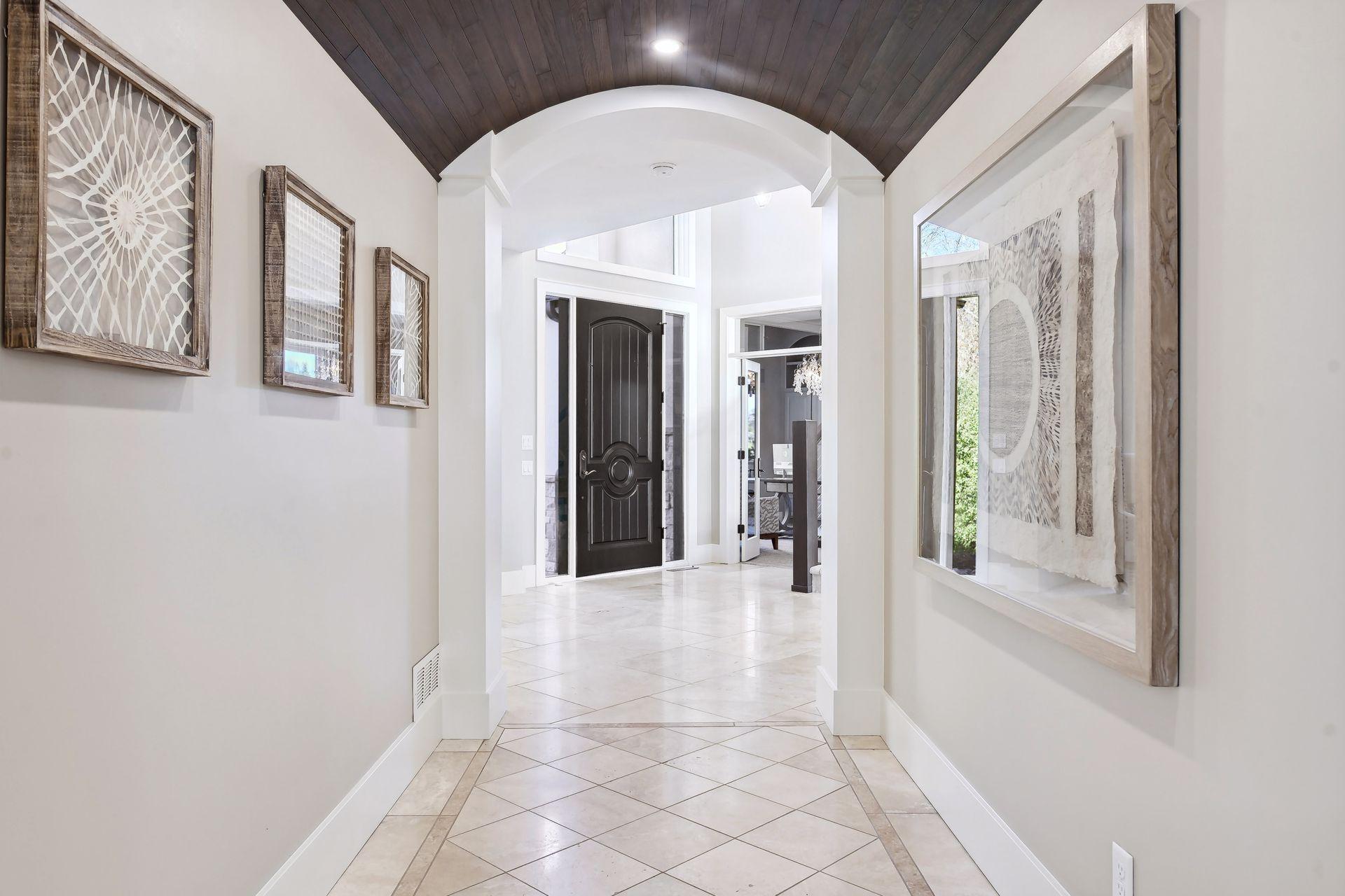 Intricate details like the coved wood ceiling add dimension and character.