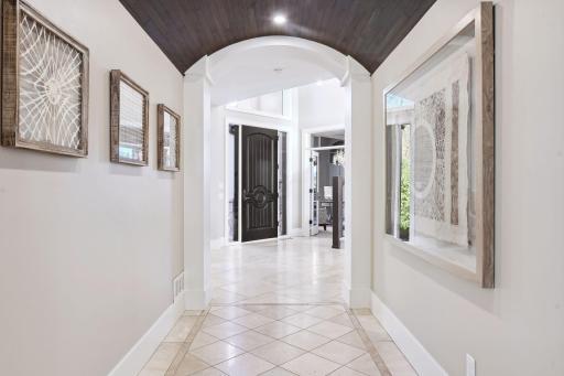 Intricate details like the coved wood ceiling add dimension and character.