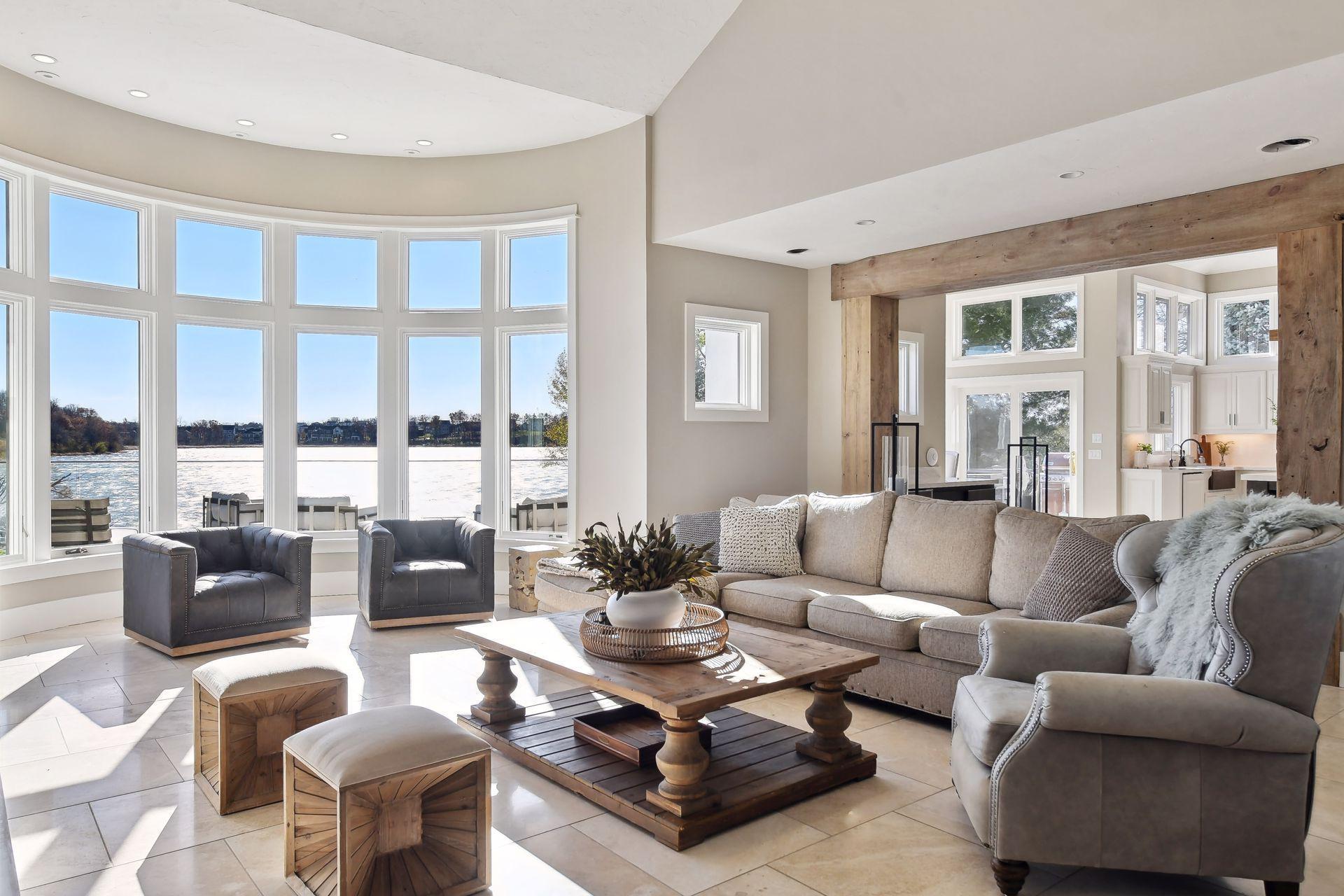 Experience the grandeur of soaring ceilings that elevate the living space while maintaining a cozy and comfortable atmosphere.