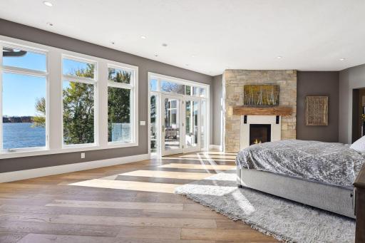 Awaken to the gentle lapping of the lake and flickering warmth of the fireplace.