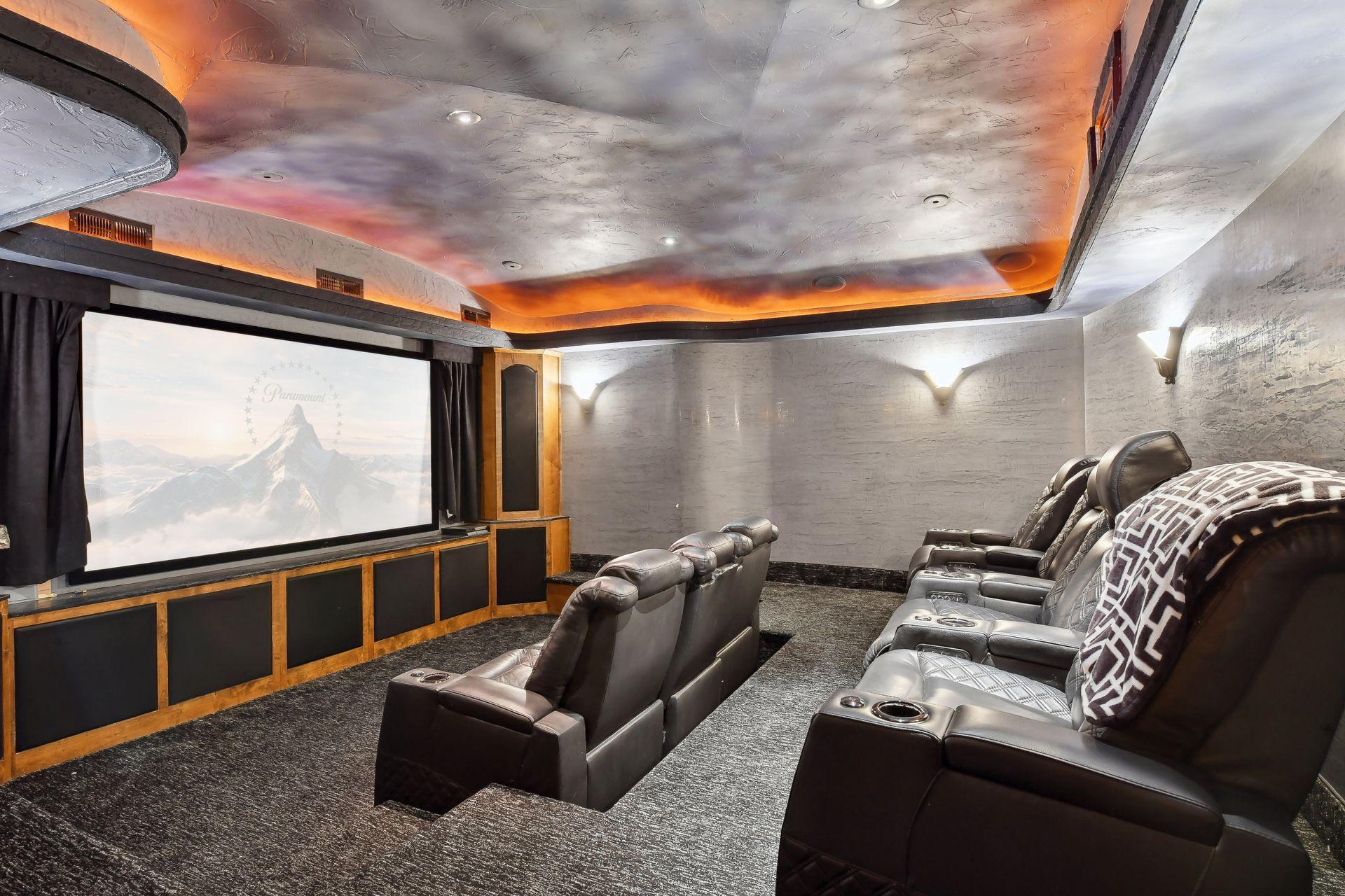 Escape into cinematic bliss in the lower level media room.
