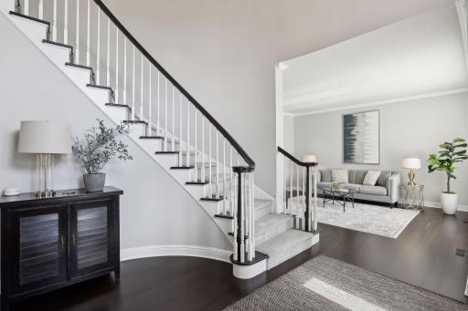Updated with a eye catching curved staircase when you enter