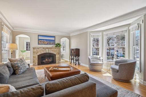 Spacious sunny living room you really can live in! The photo above the gas fireplace is a TV!