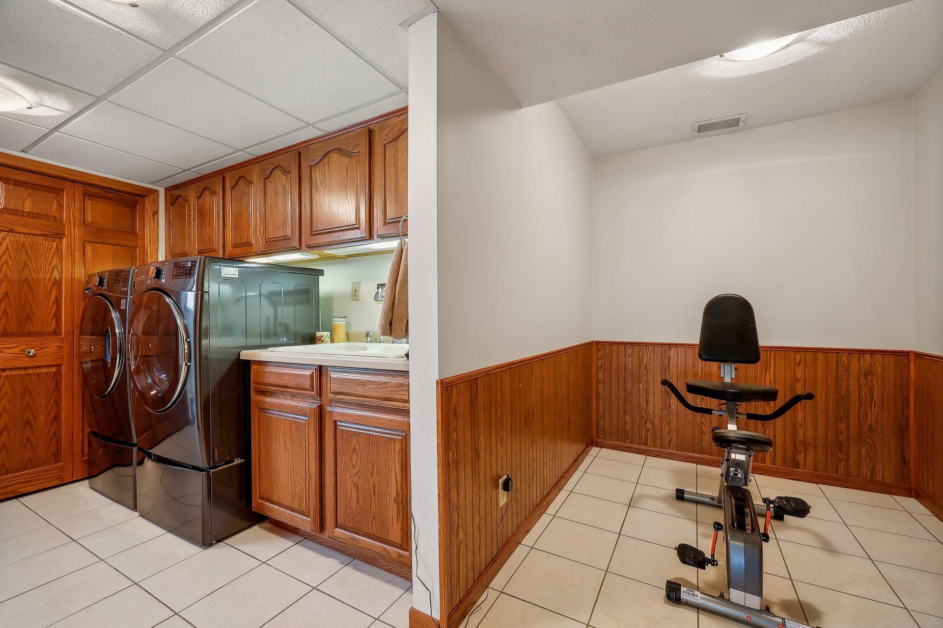 Great flex room next to laundry room, can be exercise, craft/hobby or more storage!
