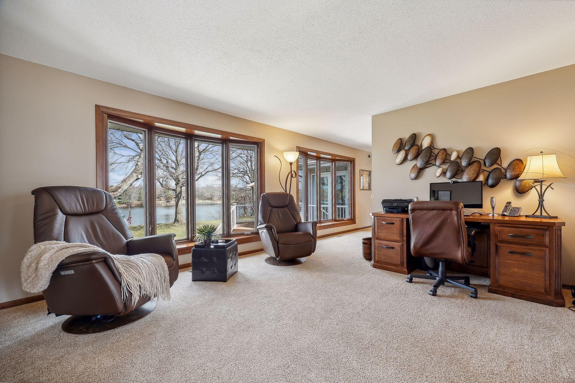 Living and dining rooms offer incredible views of the Mighty Mississippi