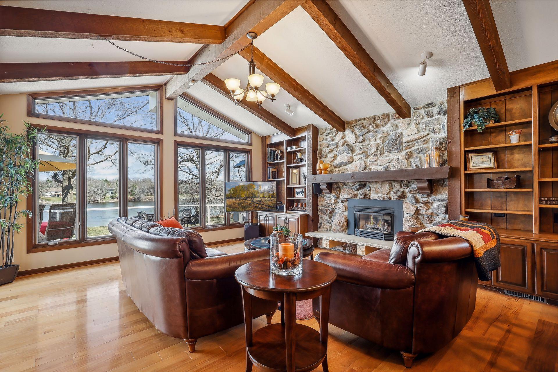 Stone gas fireplace highlights your family room