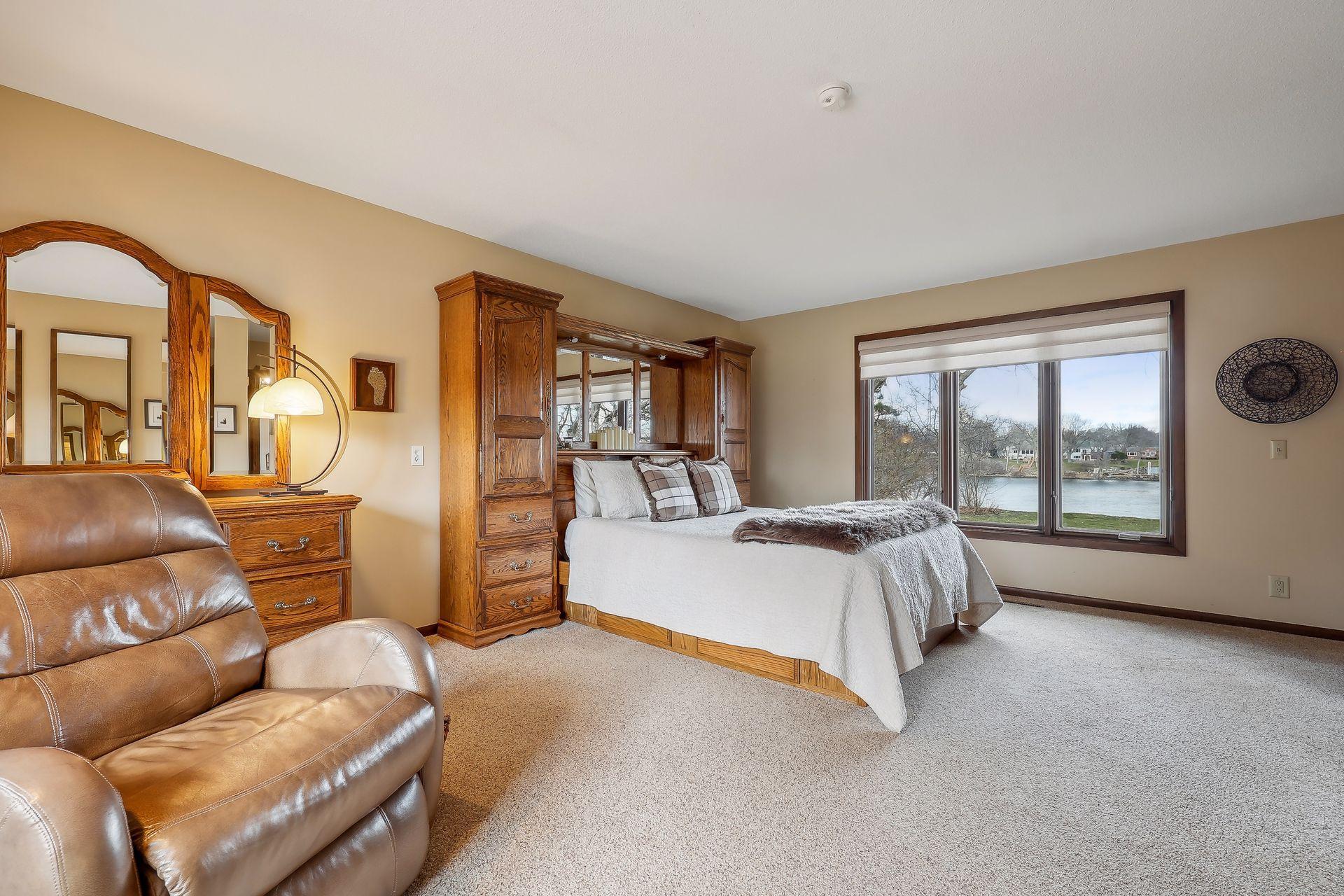Primary BR is located on the main level and boasts river views like no other home.