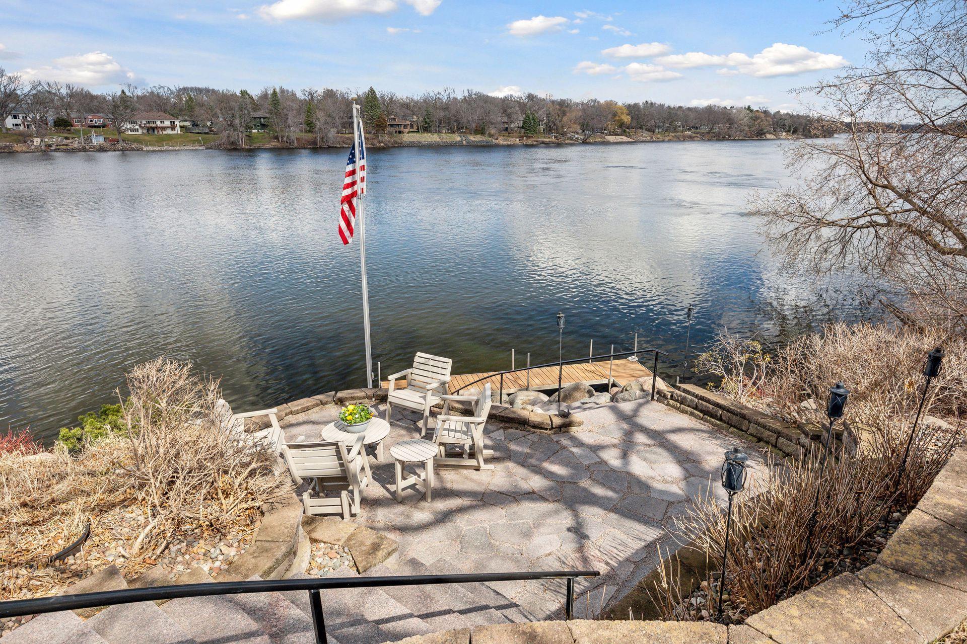Morning sunrises and evenings sunsets await you from your stone patio. Granite stairs lead you to/from your dock