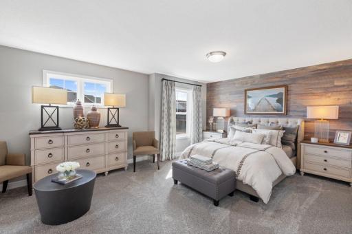 (Photo of a decorated model, actual homes finishes will vary) Find your retreat in this stunning owner's suite. Enjoy the exclusivity of a private bath and huge walk-in closet.