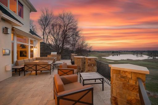 Whether you're sipping your morning coffee while watching golfers tee off or enjoying a sunset cocktail with the tranquil lake as your backdrop, every moment on this deck is a picturesque escape.