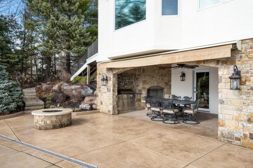 Step into your enclosed patio oasis next to the pool, where the allure of outdoor living meets the comforts of home. This versatile space is equipped with a grill, perfect for hosting barbecue gatherings with family and friends.