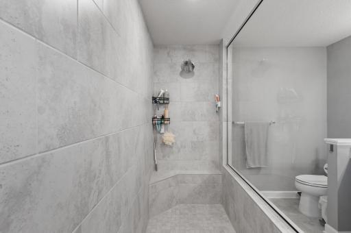 Gorgeous Shower with plenty of room and tiled all the way up to the ceiling