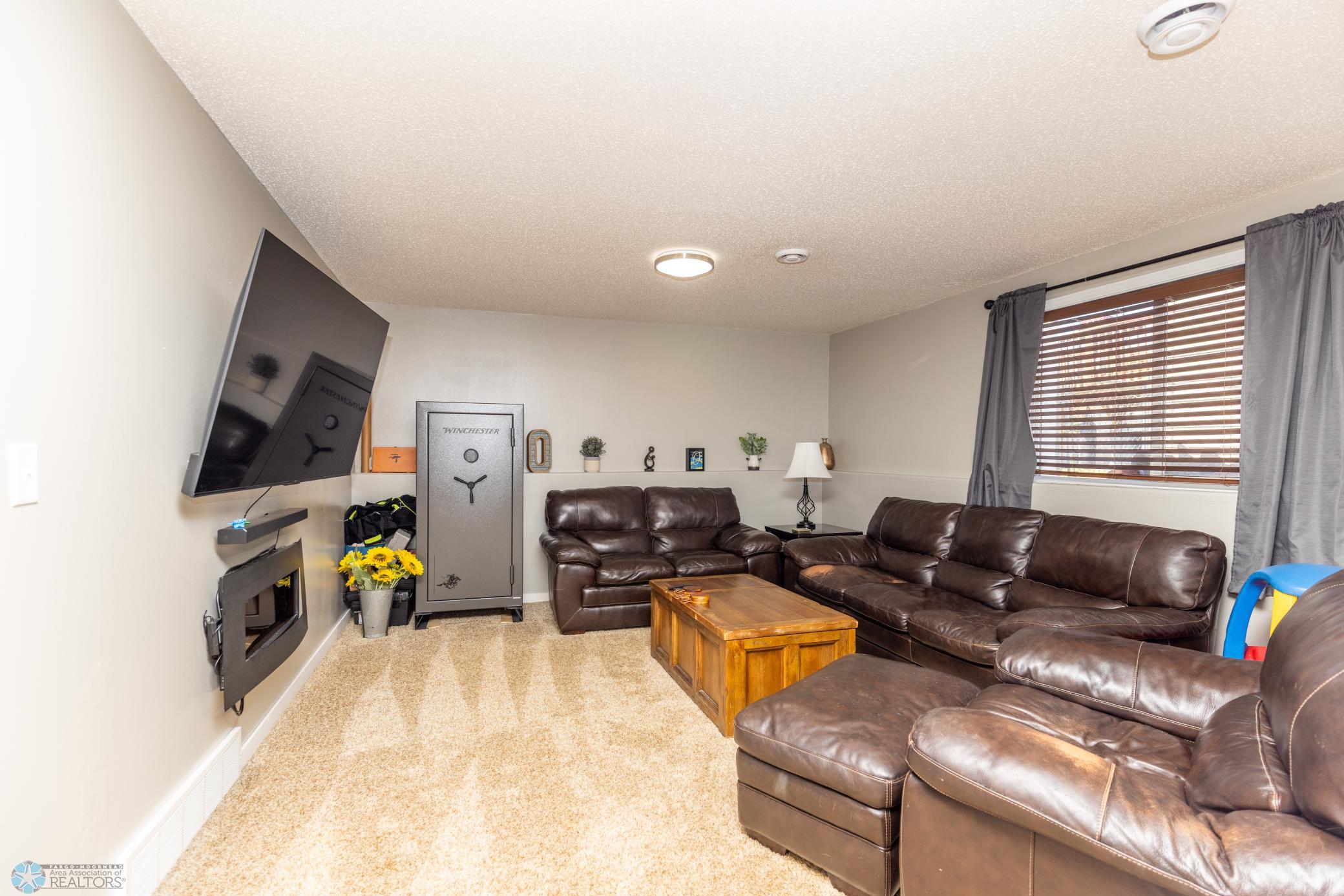 TV mount included, electric fireplace excluded.