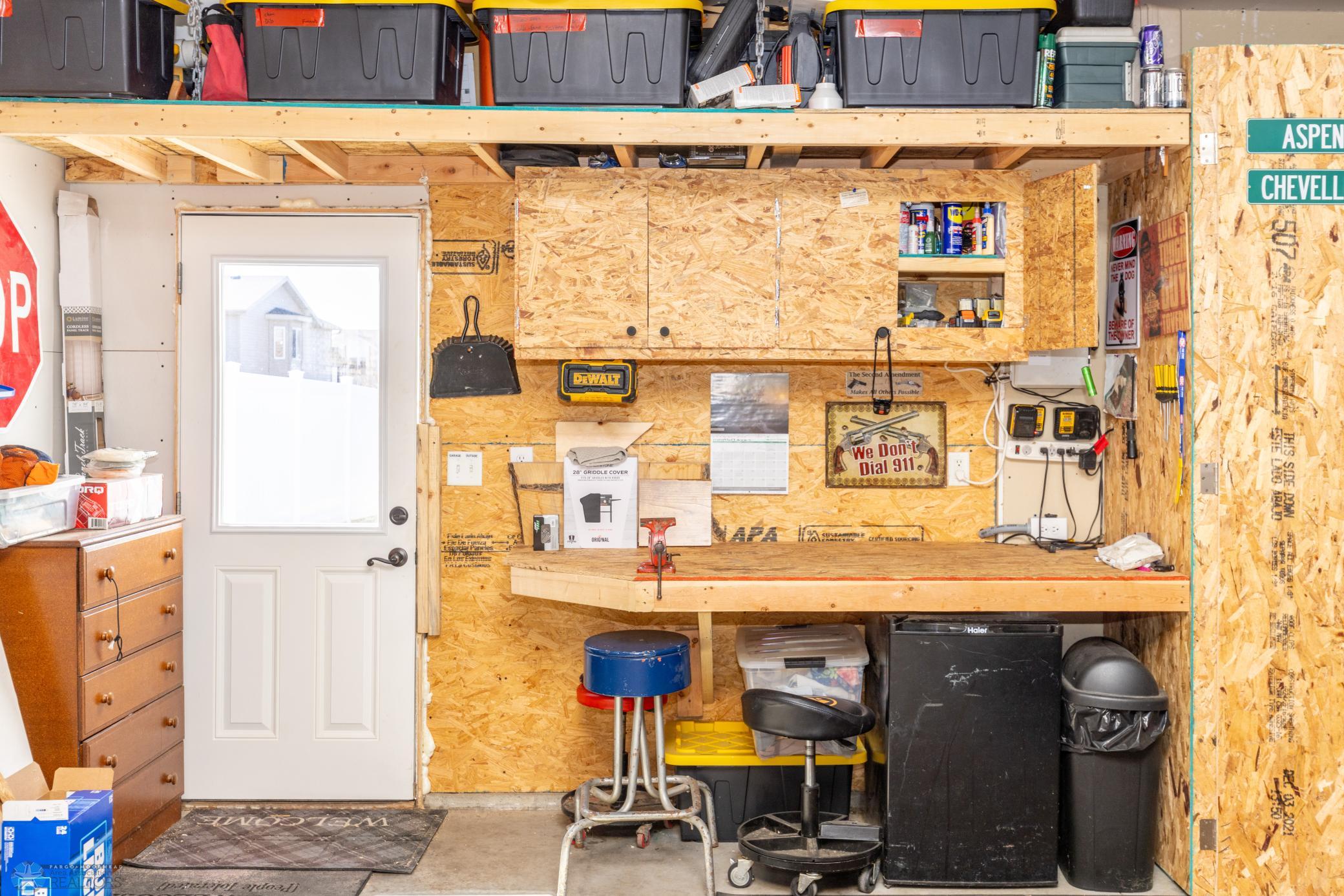 New service door in 2023 and built in workbench.