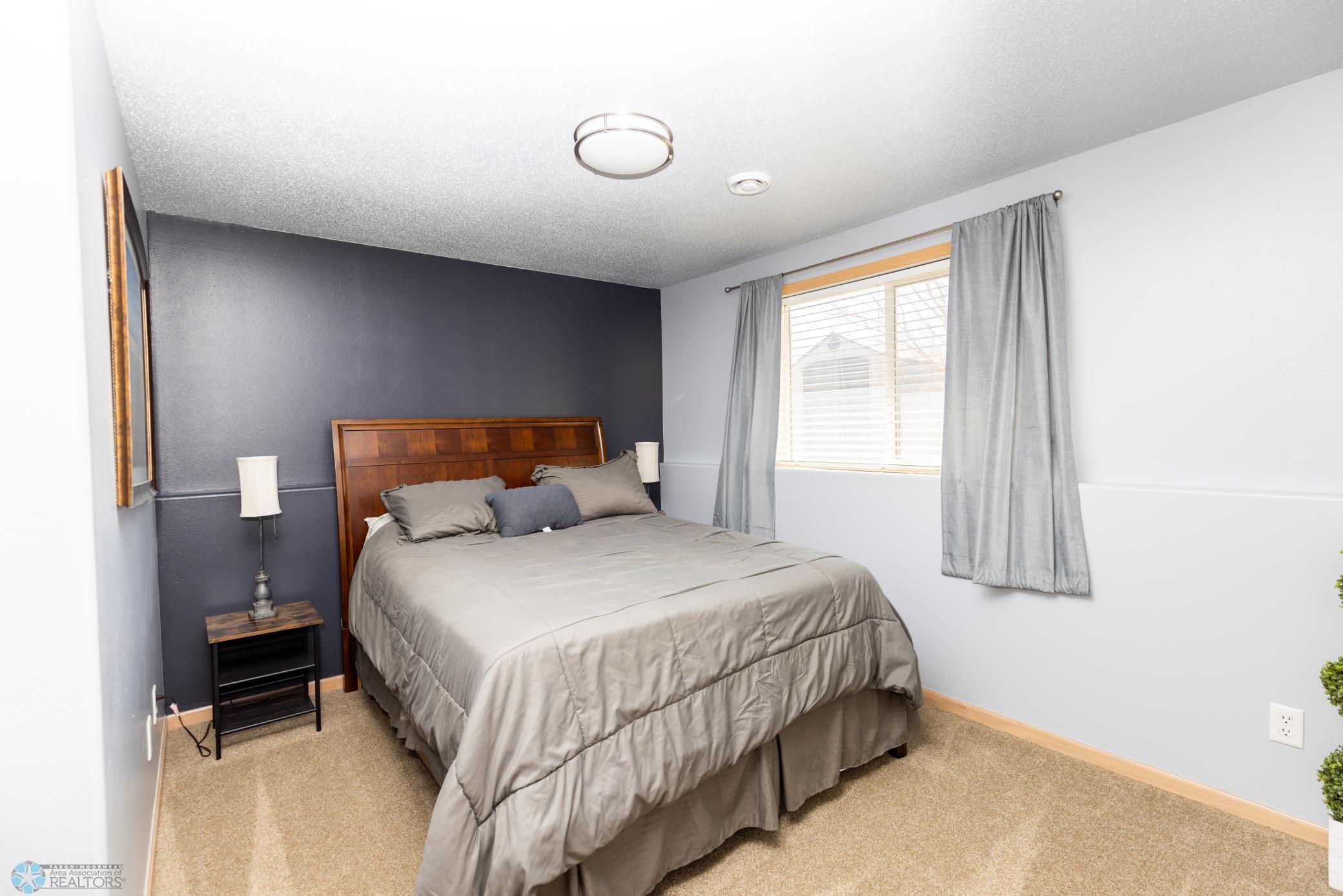 4th bedroom has new carpet