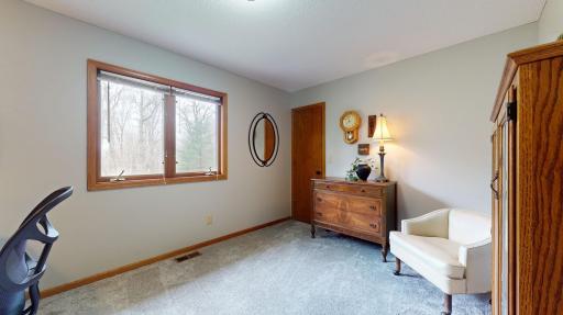 Upper level 2nd Bedroom w/large closet and updated carpet/paint