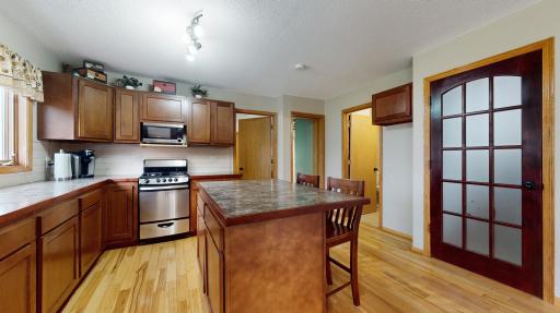 Lower Level Kitchen is great for family, friends or possible renters. Frech door to upper level for added privacy