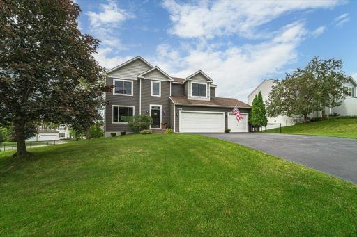 This 4BR WALKOUT two-story has great curb appeal with NEW SIDING and NEW WINDOWS, and offers a fully-fenced backyard ready for family entertainment!