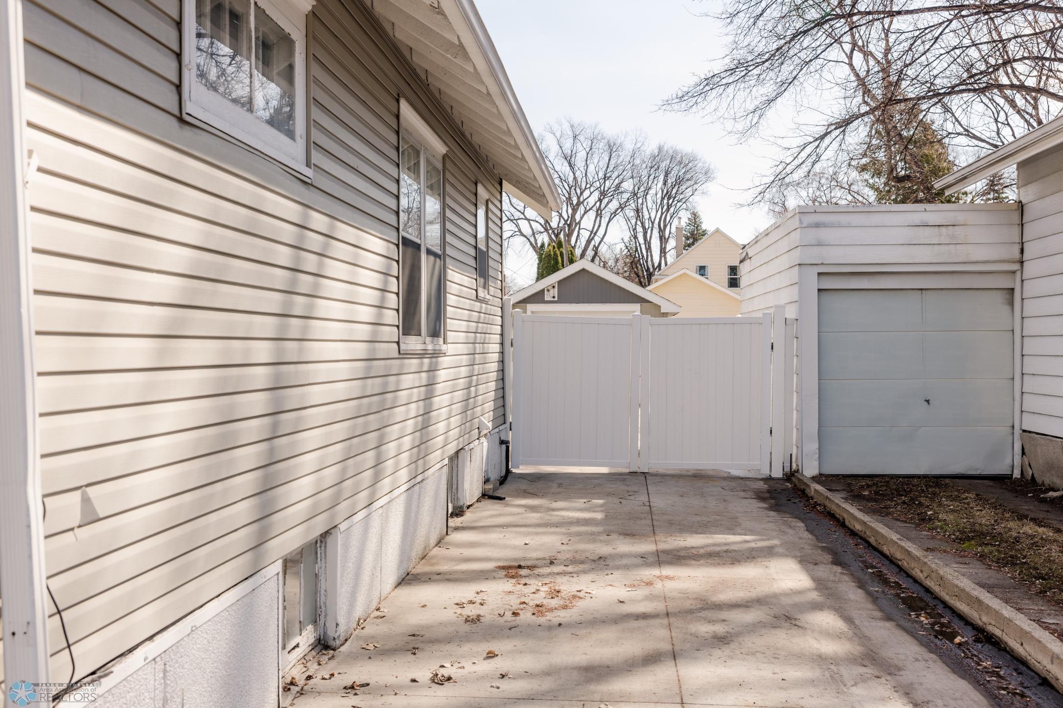 Gated Backyard / New Concrete