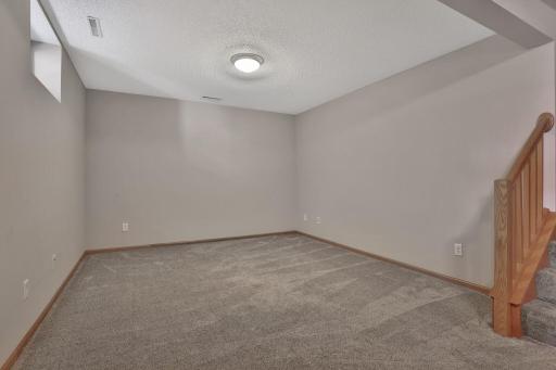 Plenty of space to add a couch and Tv for basement family room if you want