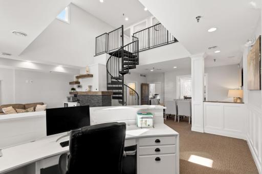 The building offers a sleek design with space-saving spiral staircase.