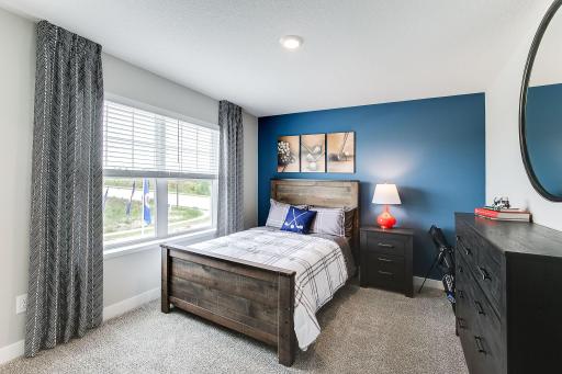 Secondary bedroom. *photo of a model home, selections and finish will vary.