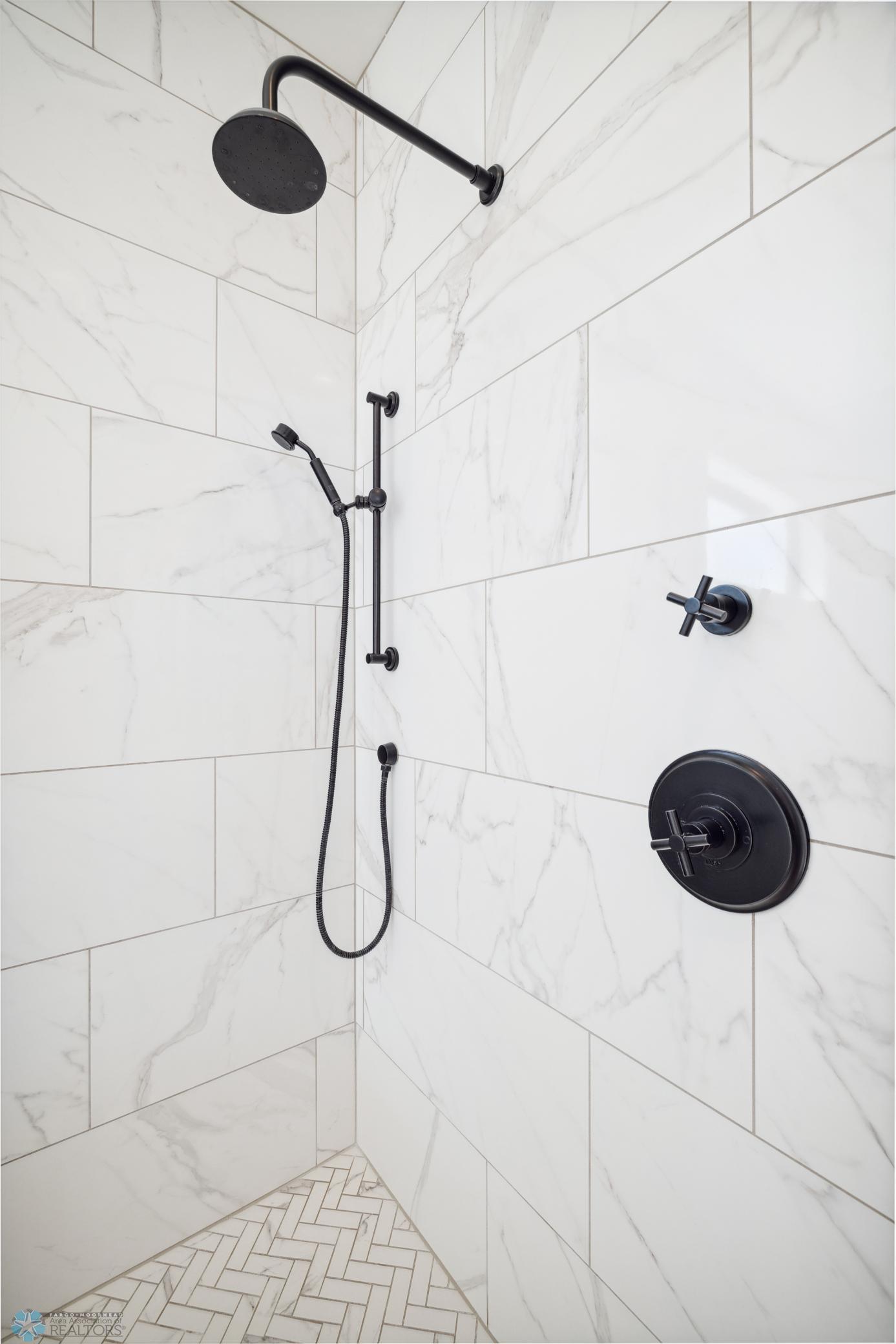 Private Primary Bathroom Tile Shower