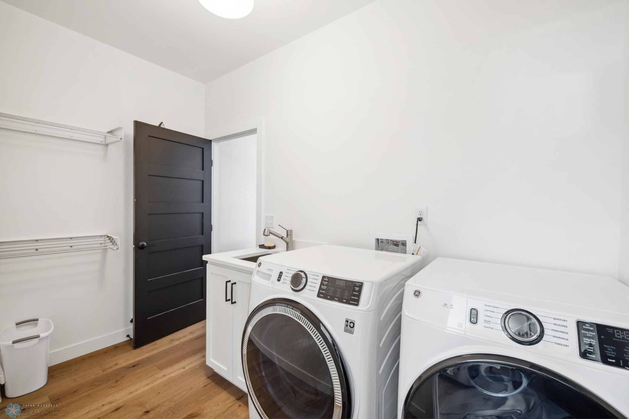 Hollywood Laundry Room Off Primary Bedroom Quartz Counters