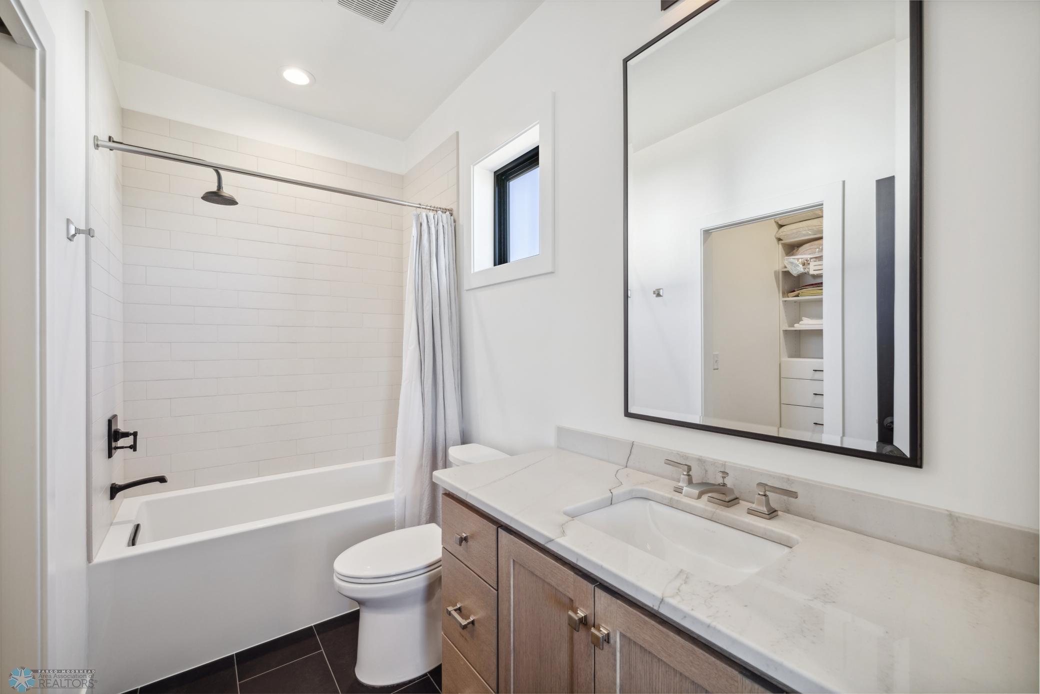 Bedroom 2 Private Bathroom Natural Stone Counters