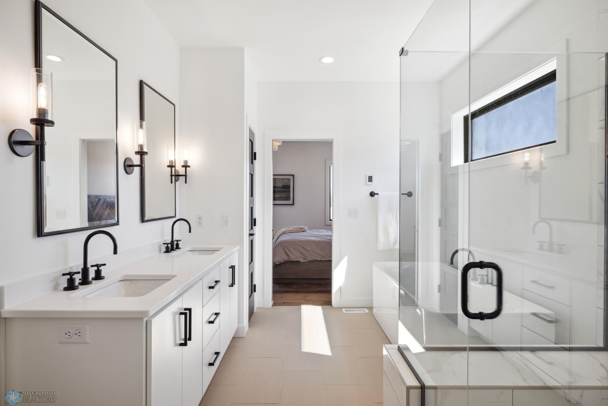 Private Primary Bathroom Dual Sinks Quartz Counters