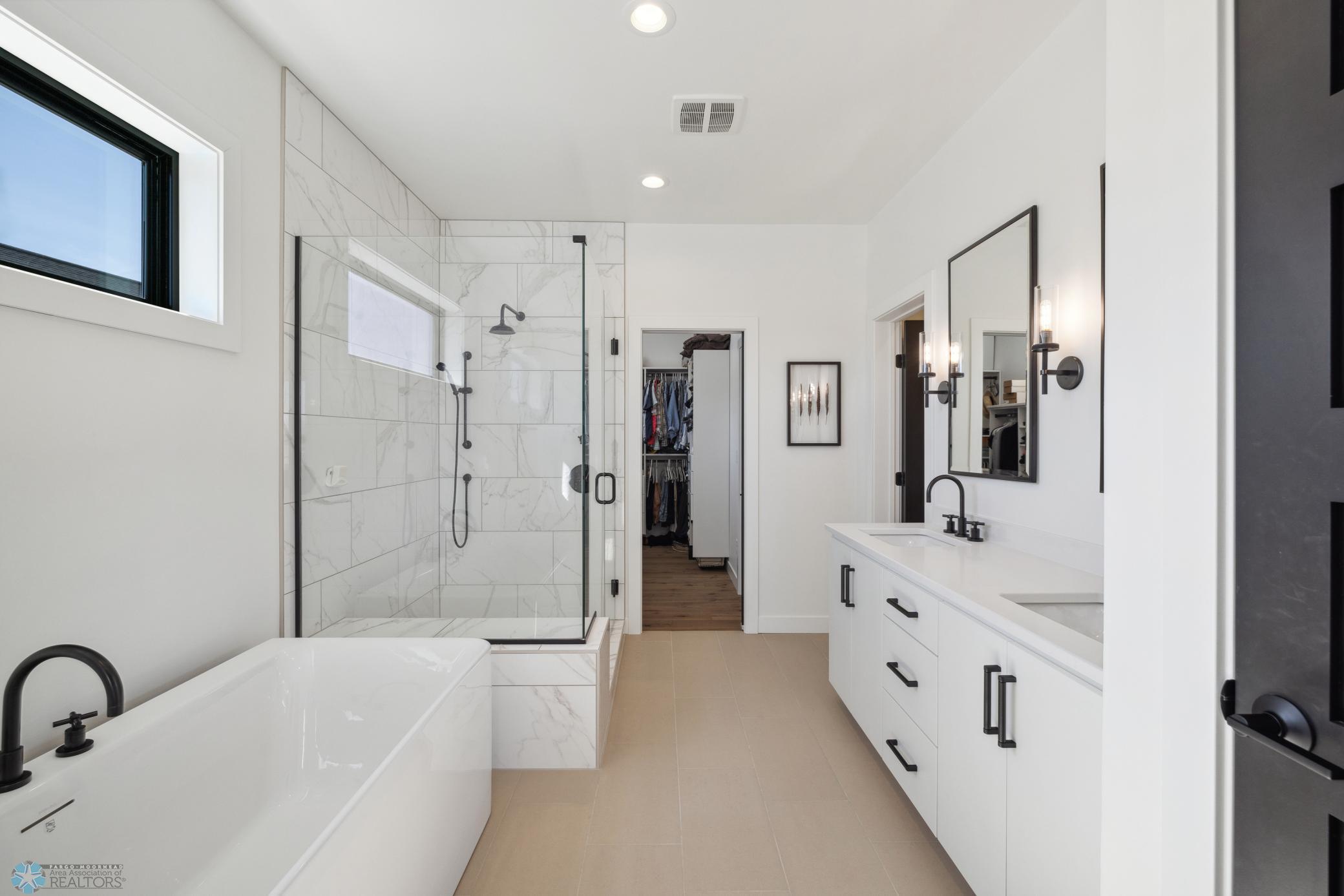 Private Primary Bathroom Dual Sinks Quartz Counters