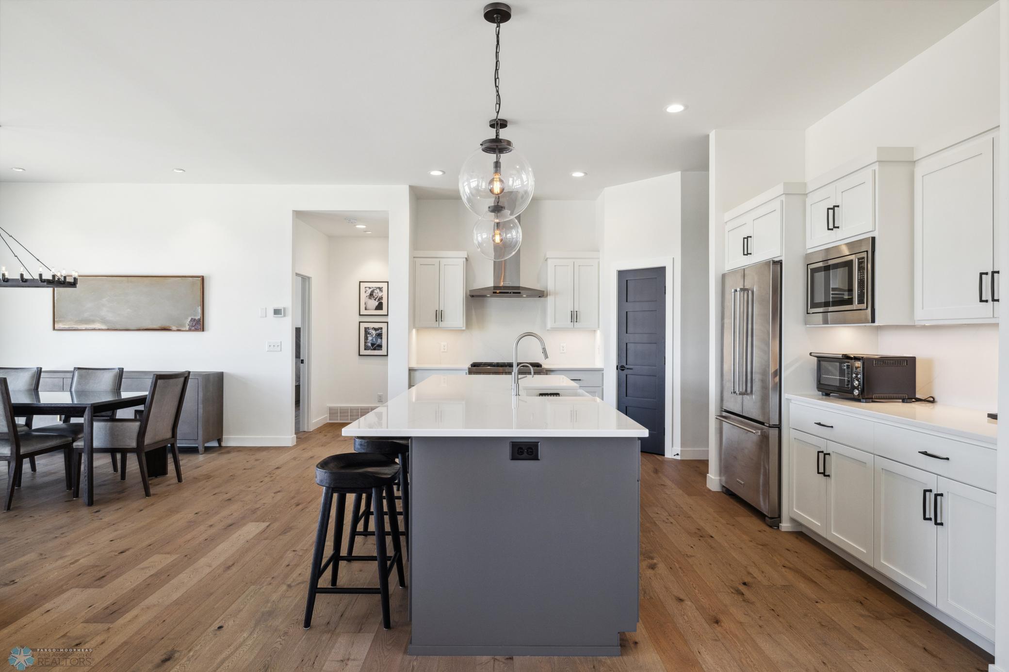 Kitchen Featuring Gas Range & Pantry