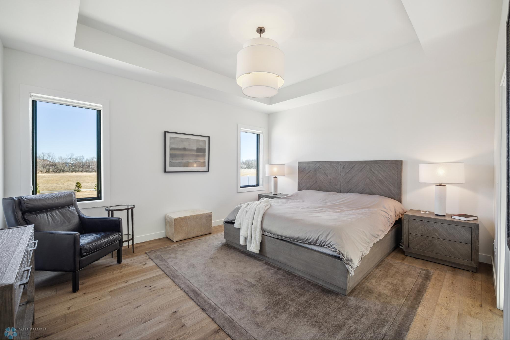 Primary Bedroom Overlooking Private Backyard