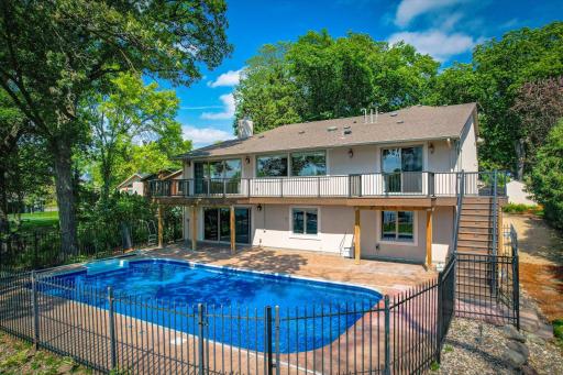 Heated cement pool provides an additional area for summer lakeside enjoyment.