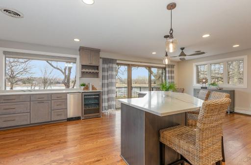 Large kitchen island with breakfast bar that seats four people comfortably.