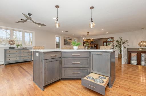 Custom pull-out drawer in the island for dog/cat dishes that can be hid away when not in use!
