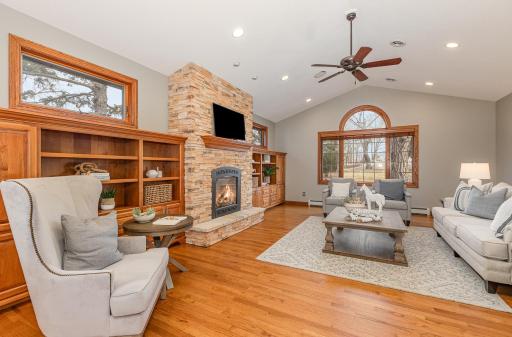 The main floor livingroom feels even more spacious with a vaulted ceiling.