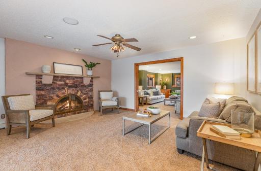 The lower level has an expansive area for entertaining with a bar area, flex space, and family room