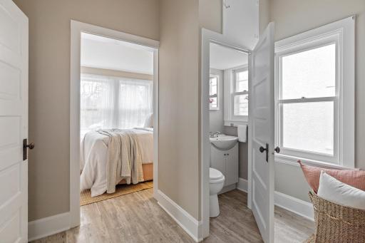 Primary suite also includes an updated half bath and sleeping nook.