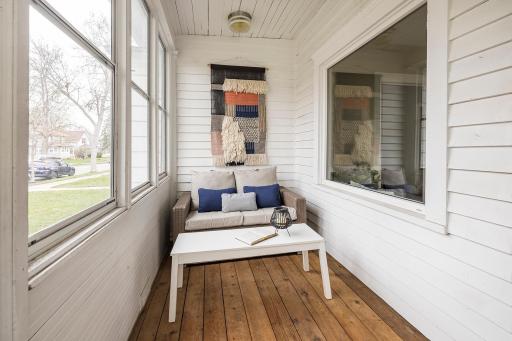 Cozy front porch with west-facing windows — enjoy afternoon light and sunsets.