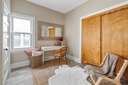 The coolest primary suite — sitting/dressing area and large closet pictured.