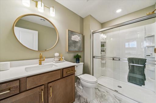 Owner's en-suite has a spa-like 3/4 bathroom