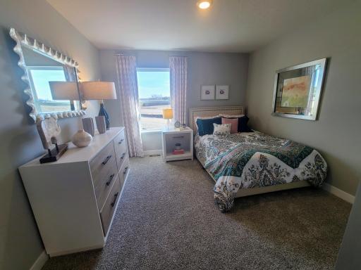 Bedroom #3. Photo is of model home. Colors and options may vary. Ask Sales Agent for details.