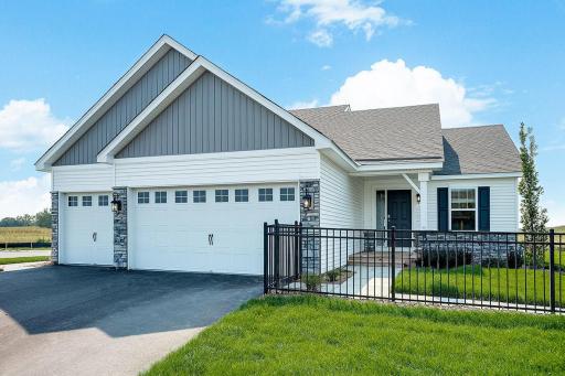 Welcome home to the Bryant II at Ravine Crossing in Cottage Grove! Photo is of Model home. Options and colors may vary. Ask Sales Agent for details.