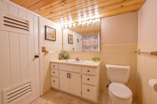 Lower level 3/4 bath with walk in shower and sauna