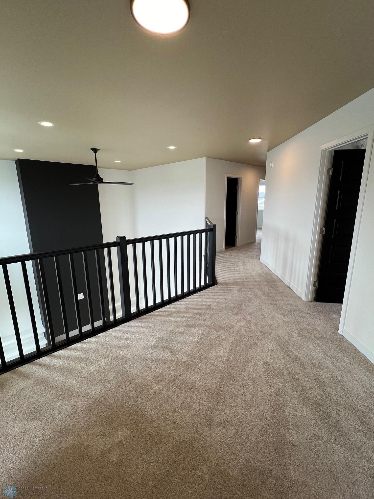 top of stairs hallway to rooms-laundry.jpg