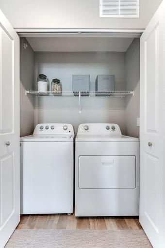 Upstairs laundry is convenient and easy - how chores should be! Model home, details will vary.