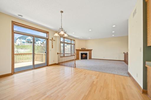 The dining area and openness to the living room, provide an easy setting for entertaining friends or family. The sliding door w/transom window lead to the deck with mnt-free floor boards.