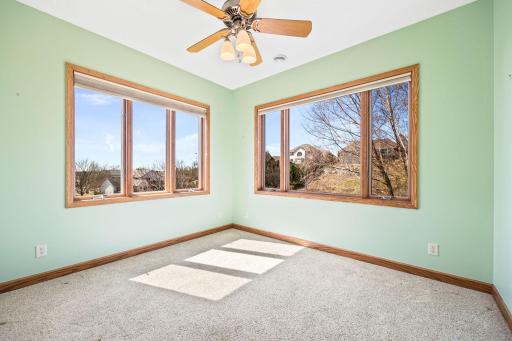 Sunroom with more views to the backyard. Nice-sized room providing for furniture options.