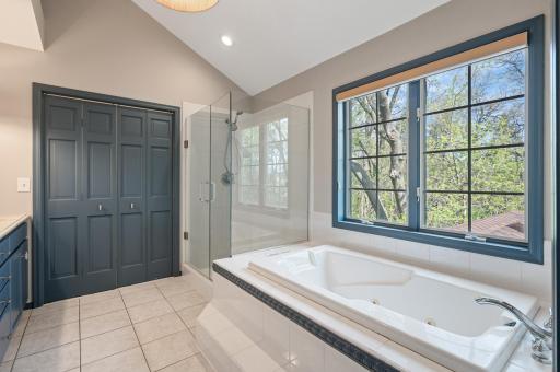 Again you have a soaking tub with separate shower. The double doors lead to the walk-in closet.
